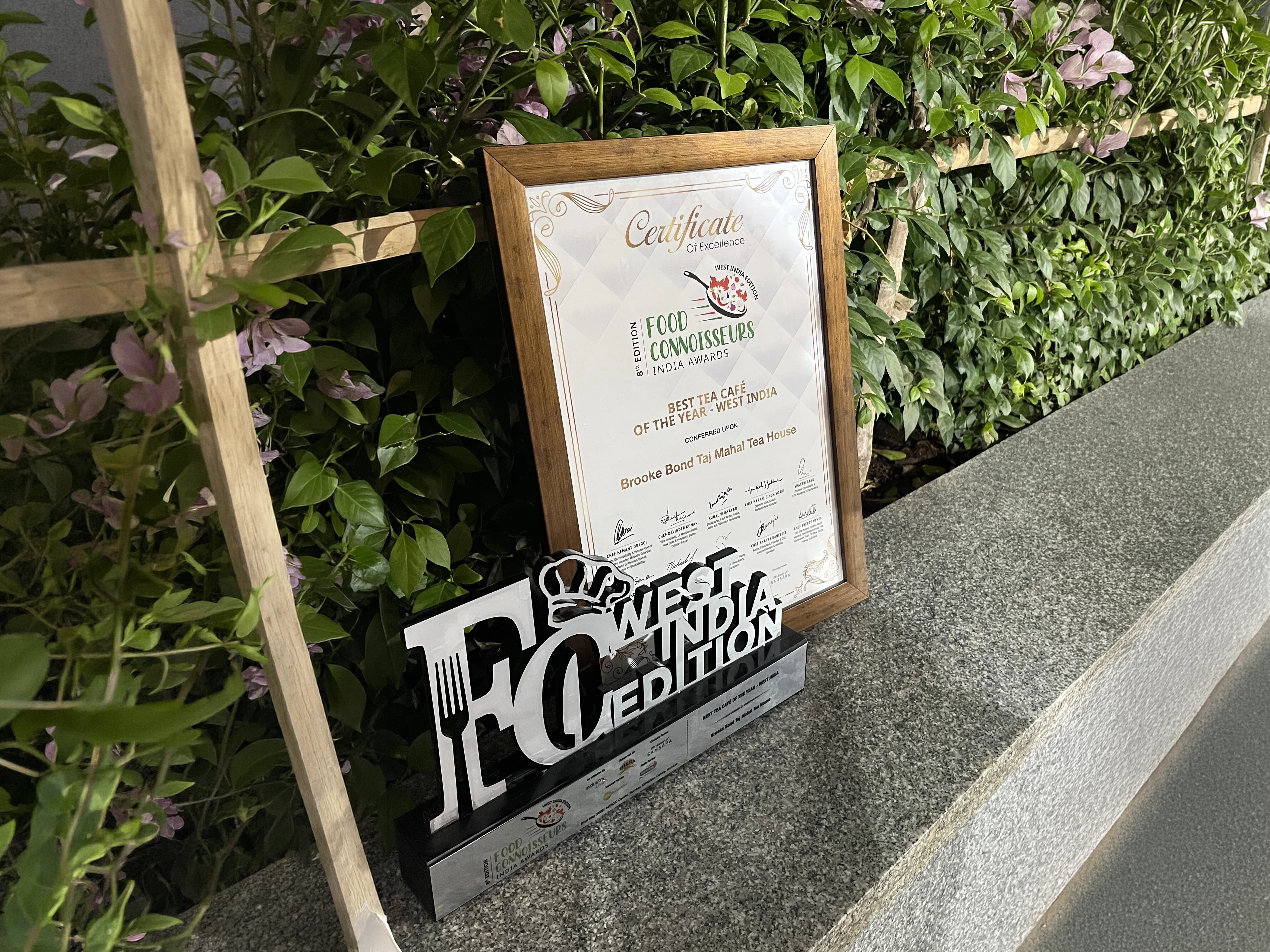 Wooden plaque for Best Tea Café.