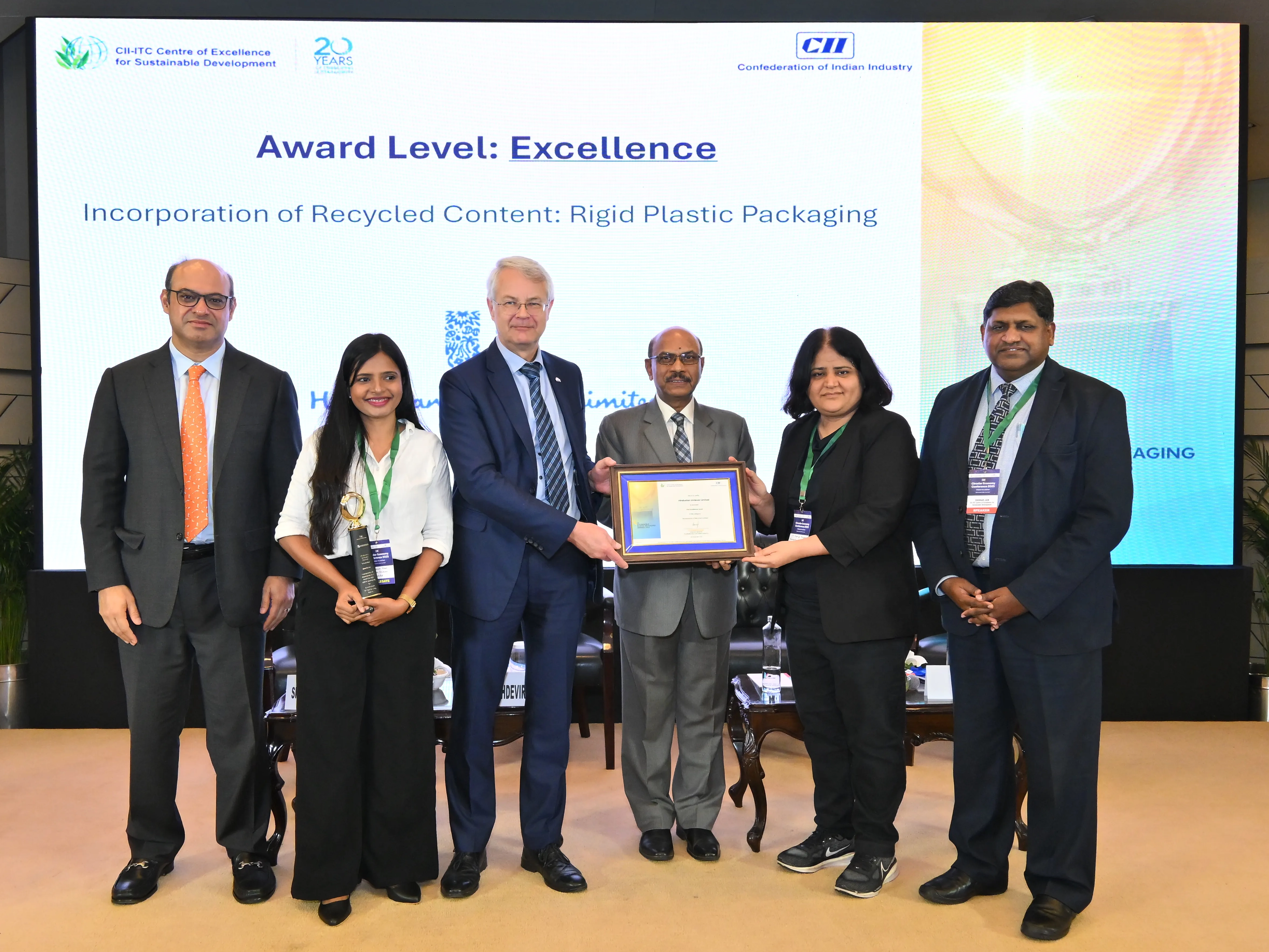 Group holding the C I I Sustainable Plastic Packaging Award.