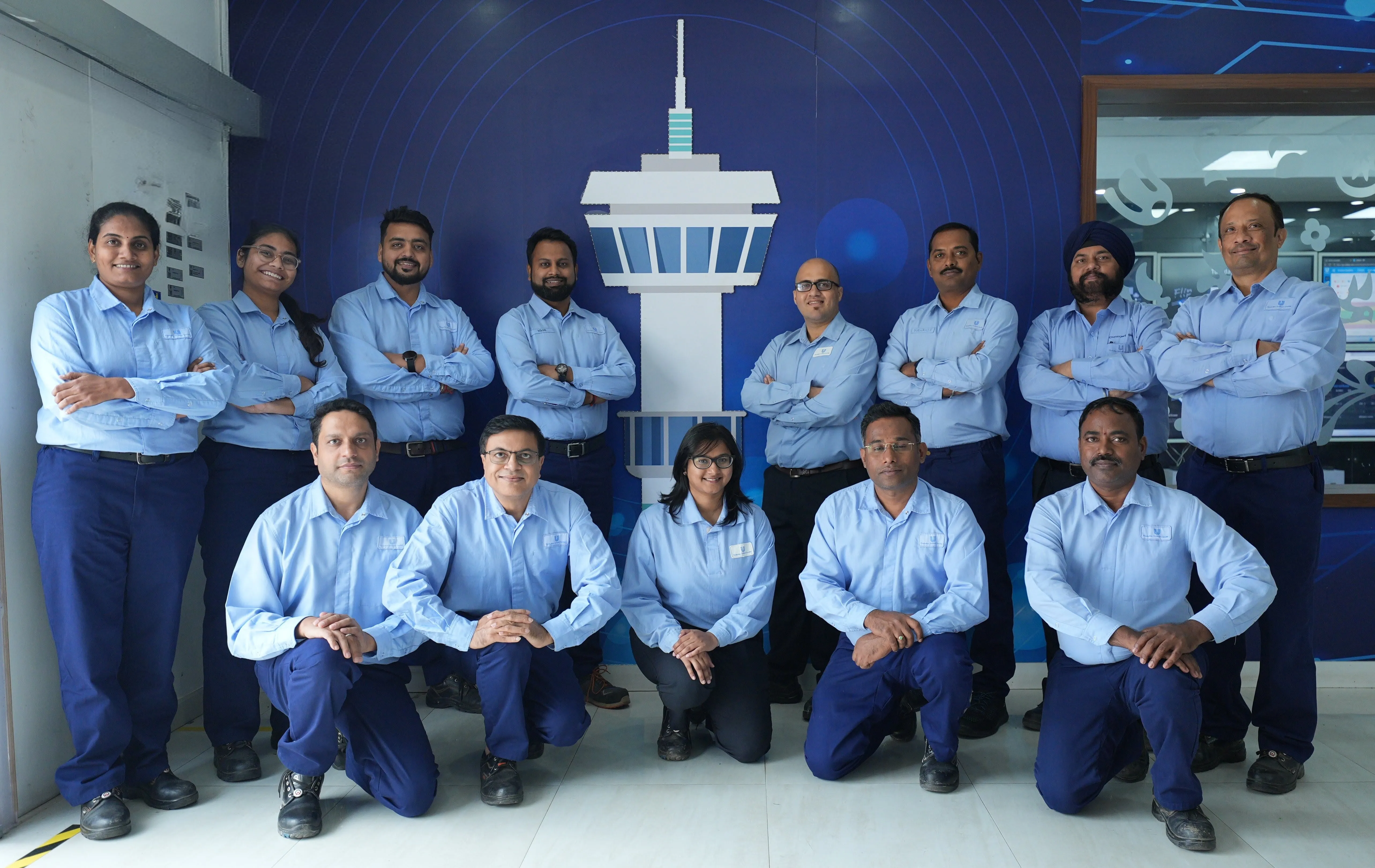 HUL Team in front of a painted wall