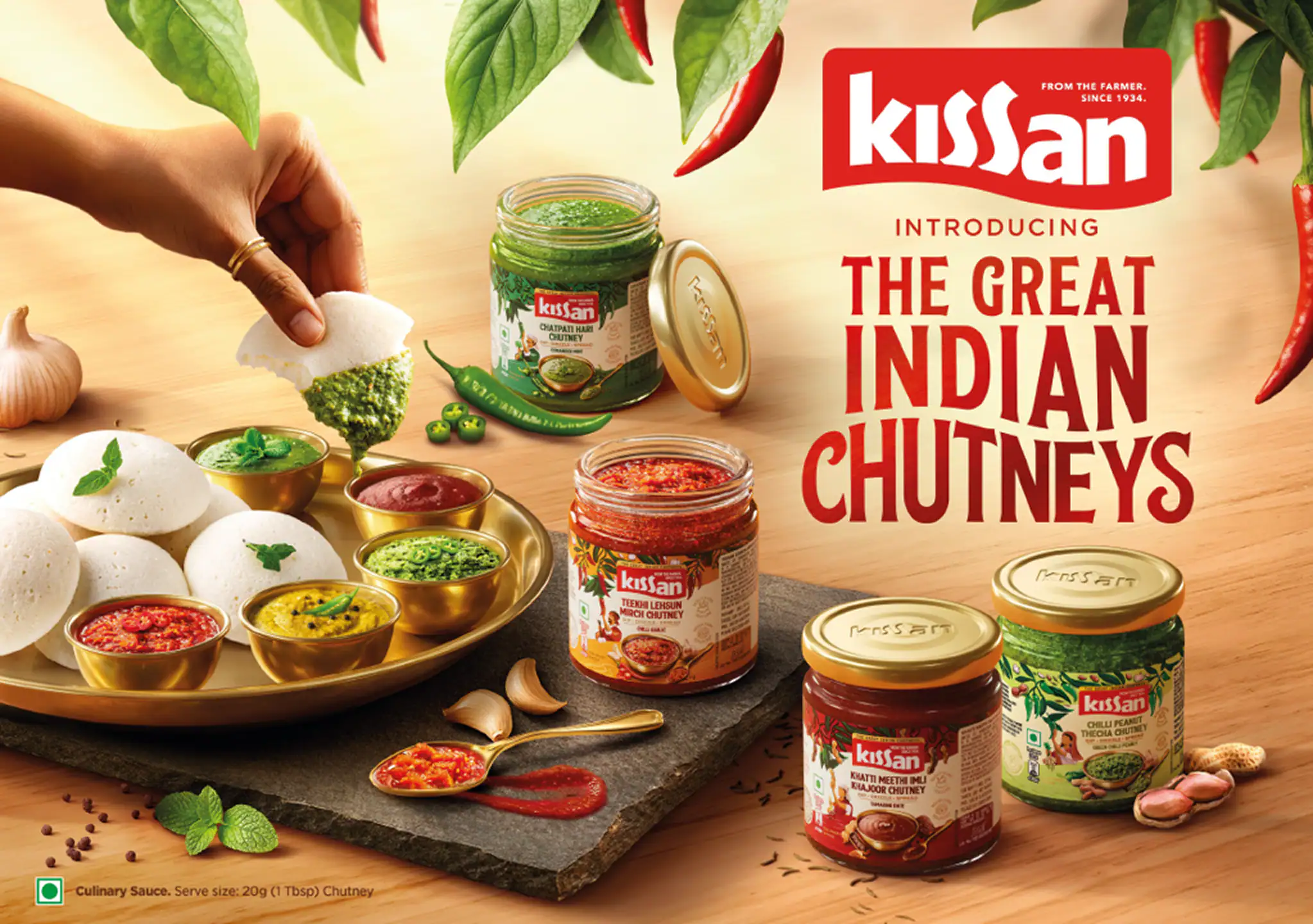 Shows image of kissan products with a clean and bright background with a green theme ; on hover the section plays the kissan advertisement in the section; The information box appears at the top left corner with a semi-transparent green background and U curve at the bottom
