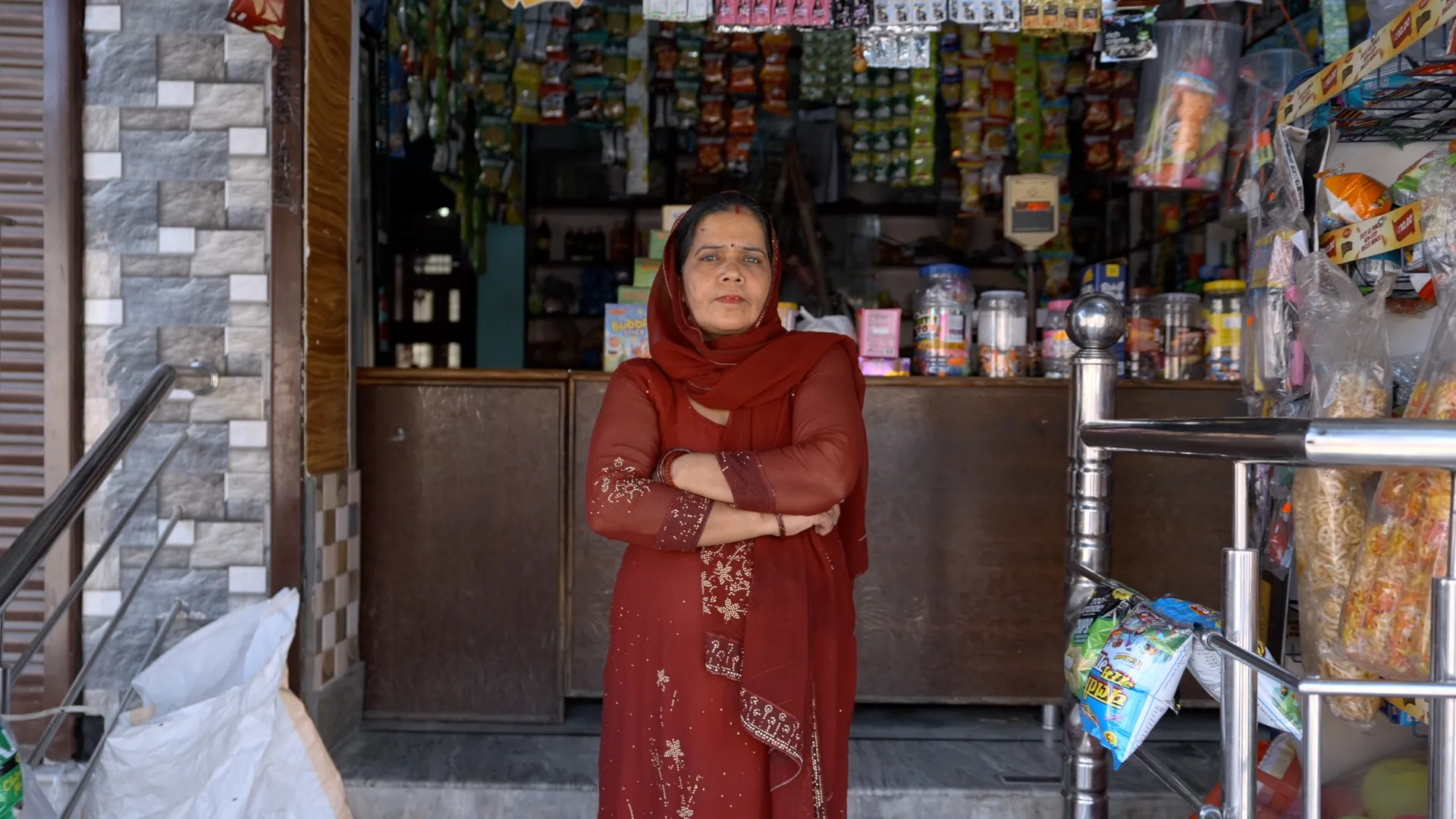 Local retail touchpoint proprietor smiling