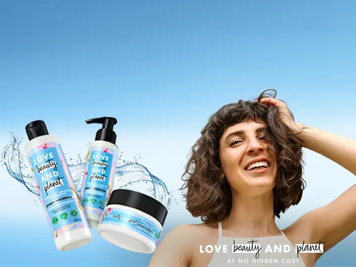 Packshot of love beauty and planet products with a woman 